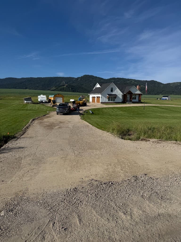 Asphalt roller compacting new pavement